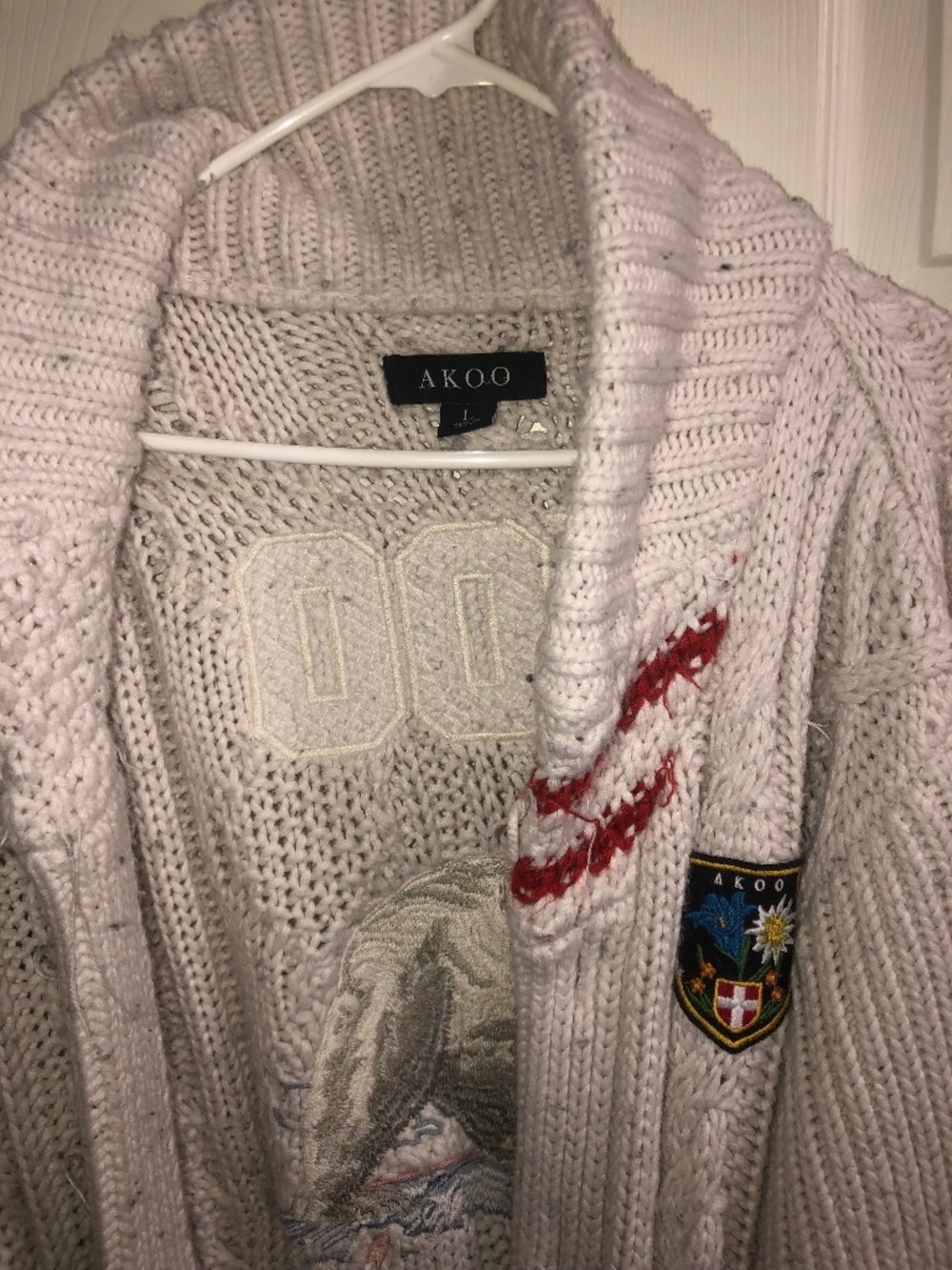 Akoo cardigan sweater used size L